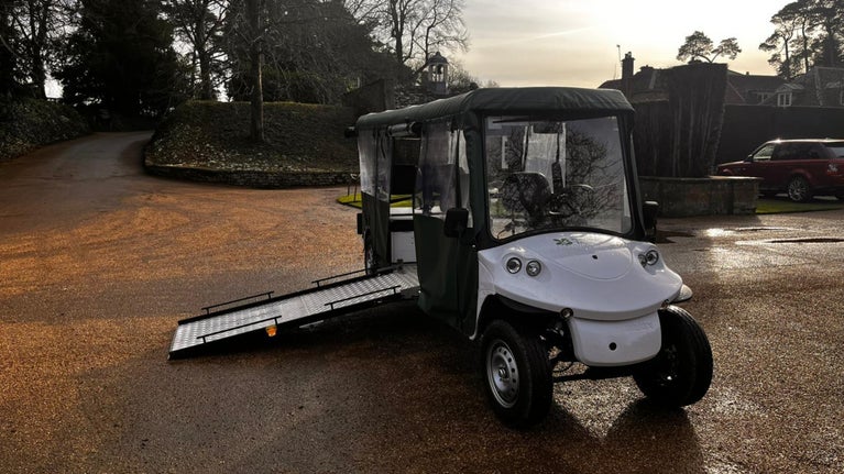 Buggy with wheelchair ramp down at the end of the main drive at Upton House